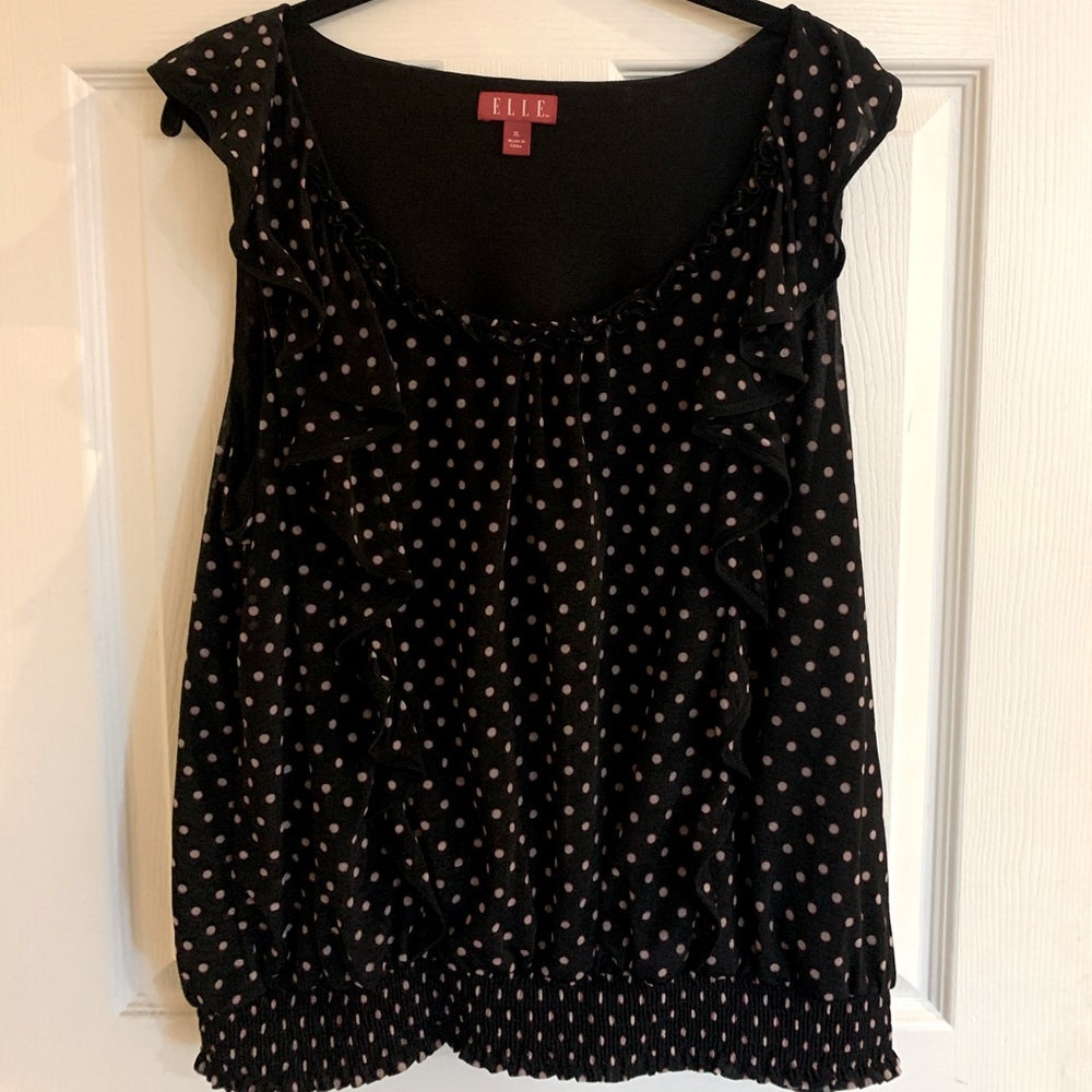 Black blouse with polka dots
